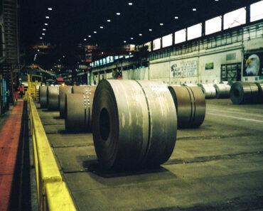 A steel plant manager and an economist go into the factory. He leaves with a story about the US economy.