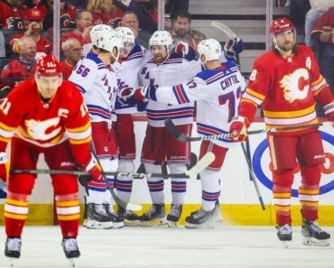 Alexis Lafreniere’s hat trick helps Rangers rout the Flames