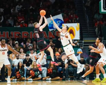 Louisville continues to upset No. 22 Miami. Louisville continues to upset No. 22 Miami.