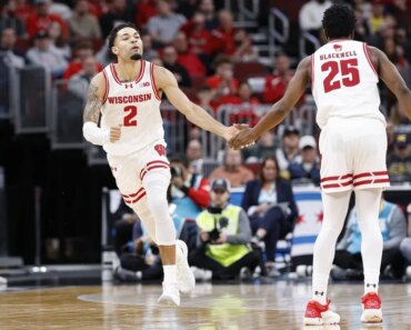 No. 23 Wisconsin beats Washington and advances to Big Ten quarters