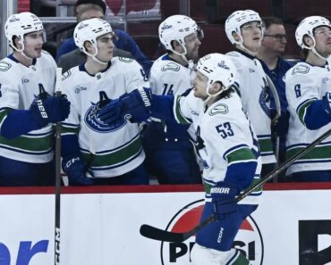 The Canucks snapped a seven-game skid with a third surge past the Blackhawks.