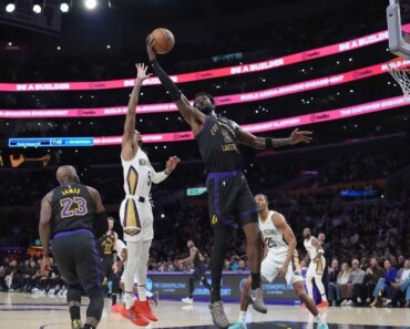 The Lakers are riding a fourth-quarter surge to pull off a comeback win over the Pelicans.