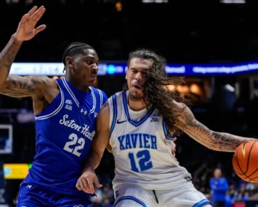 Tre Carroll’s status is in doubt as Xavier faces Marquette in the Big East tournament.